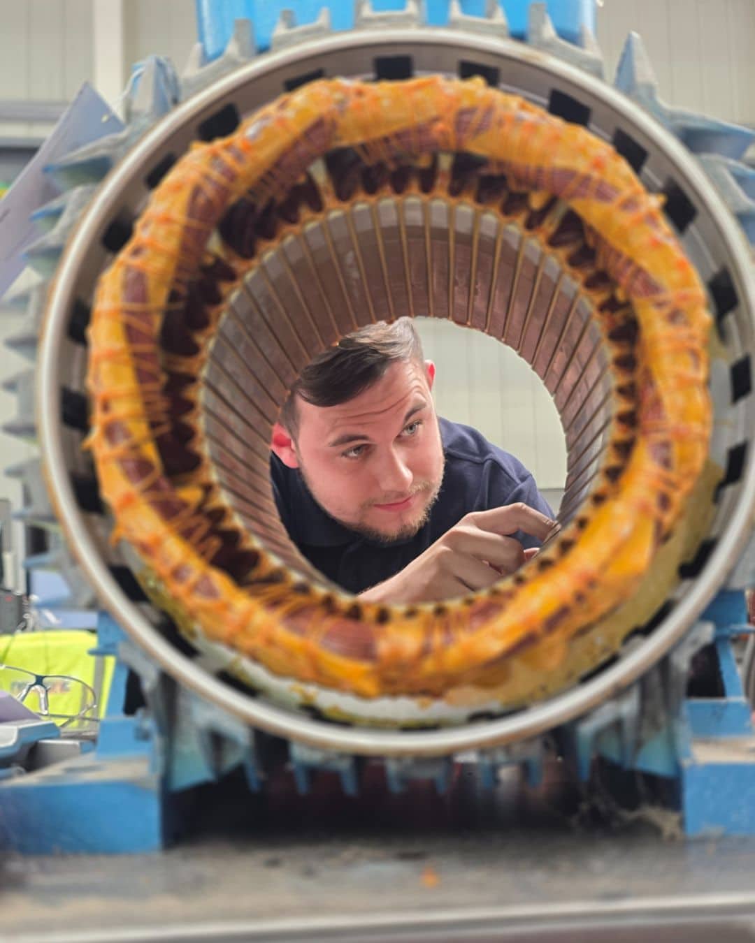 AC motor rewind inspection by Neutronic Technologies engineer during industrial motor repair.